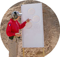 Janet shows women CWP holders how to avoid hitting a hostage before demonstrating the technique.