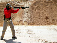 Janet Katz teaches defensive shotgun techniques with her Remington 870 12 Gauge.