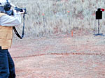 A defensive shotgun with a reactive steel hostage target in our facility.